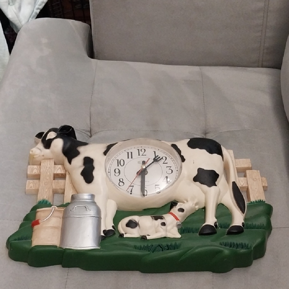 Vintage Cow Wall Clock with Black and White Accents